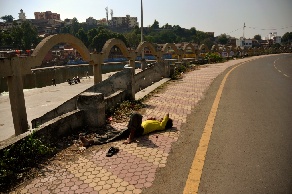 Photo of a man near the road in India.