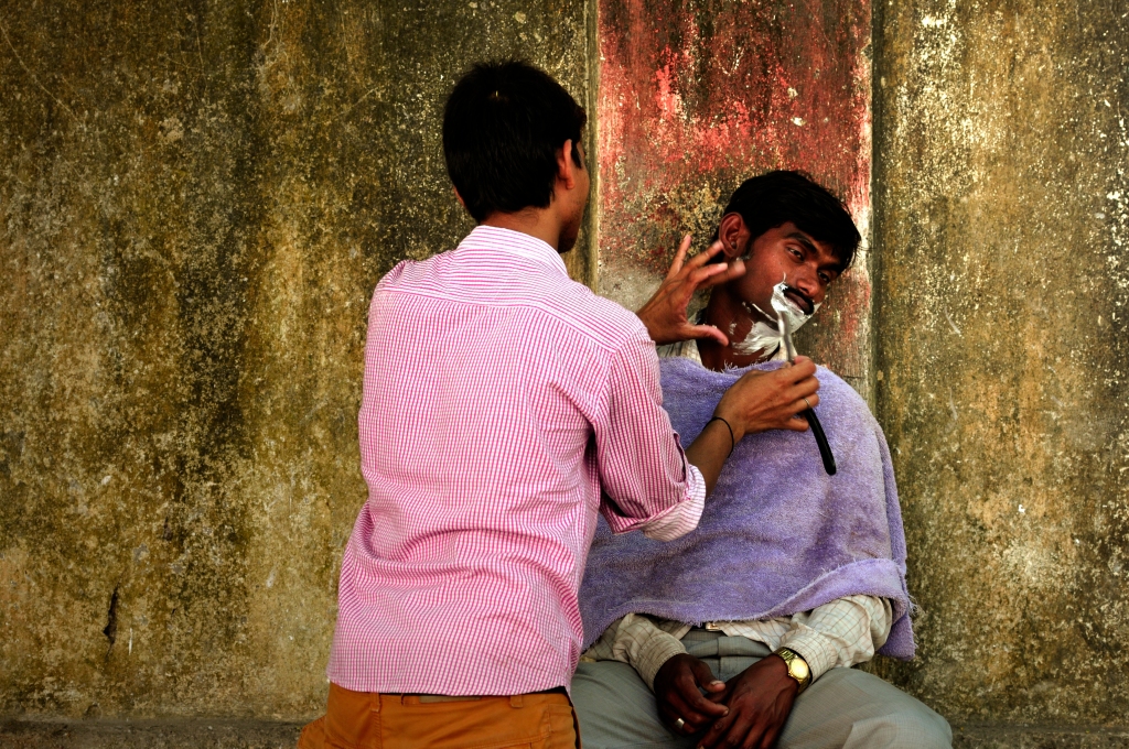 Photo of shaving in Mumbai, India.