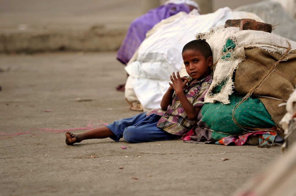 Photo of a street boy in slum, India.