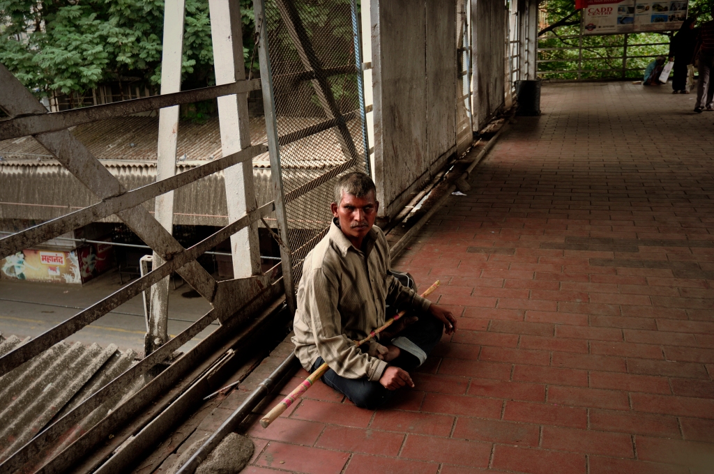 Photo of a blind beggar at Mumbai station in India.